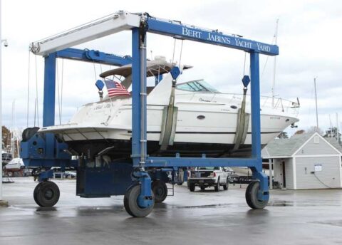 Motor Yacht be moved in slings on marine travel lift at Bert Jabin's Yacht Yard - Located in Annapolis, MD.